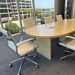 Elegant 10ft maple conference table for professional office meetings. Perfect for collaborative work.
