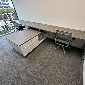 Allsteel Driftwood office bench with integrated storage and spacious work surface.
