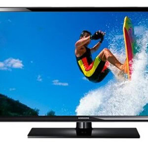 Samsung LED Smart TV displaying a surfer, with mount for easy installation.