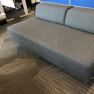 Grey modern collaboration couch for office or lounge spaces.