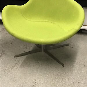 Lime green Hightower Capri lounge chair with steel swivel base, perfect for contemporary office or l.