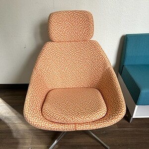 Modern Allermuir Open lounge chair with orange and white upholstery.