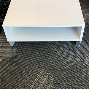 Allsteel white occasional table featuring built-in dual USB power outlets for convenient device char.