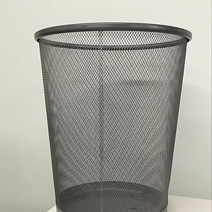 Durable stainless steel mesh trash can ideal for commercial spaces and waste management solutions.