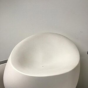 Vondom Stone lounge chair in matte white, modern outdoor furniture for stylish relaxation.