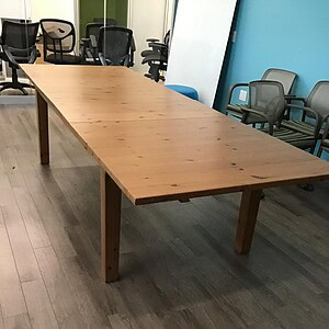 Lightwood dining table, 10ft by 4ft, sturdy with four legs, perfect for natural wood decor.