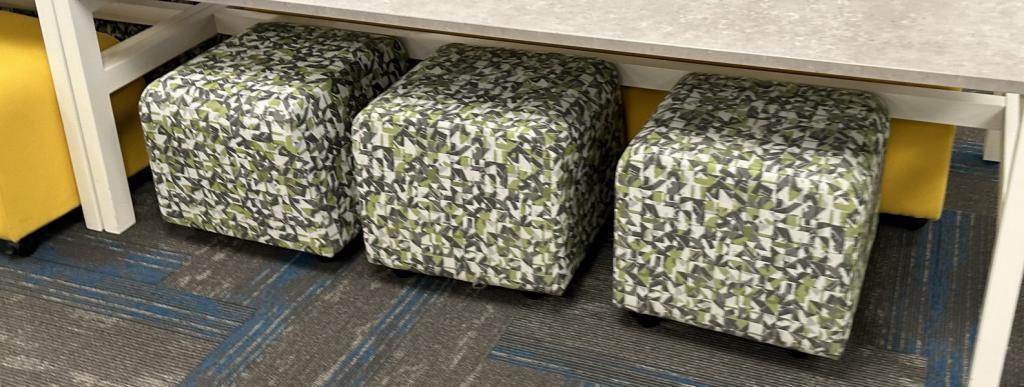 OFS Green Patterned Ottoman seats on casters