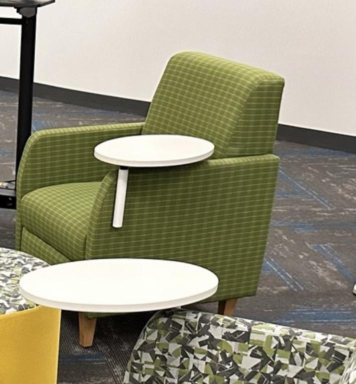 OFS green lounge chair with tablet arm