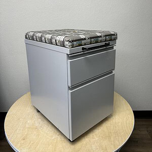 Herman Miller mobile patterned grey pedestal for office storage and organization.