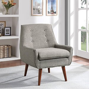 Accent armchair with mid-century modern design and wooden legs.