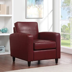 Elegant red leather club chair for living room decor.