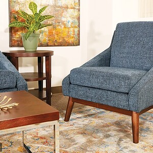 Century modern club chair for stylish living rooms.