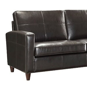 Elegant black bonded leather sofa for modern living rooms and stylish interiors.