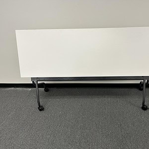 Nesting table with modesty panel, available in OFS 6, 5, or 4 foot sizes for versatile office use.