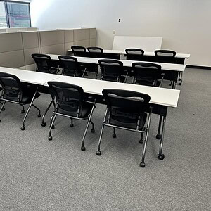 Nesting training room setup with 6x2 desks and 2 chairs for efficient workspace organization.