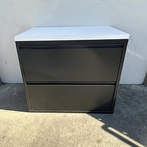 Herman Miller 30-inch black lateral file cabinet for office storage. Durable, sleek design ideal for.