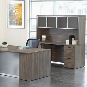 Executive office desk with glass modesty panel and storage hutch.
