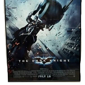 Batman on motorcycle from The Dark Knight movie poster.
