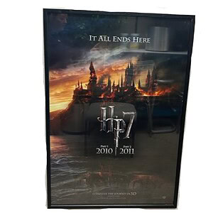 Harry Potter Hogwarts castle poster with "It All Ends Here" text, 2010-2011 dates.