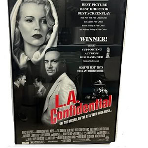 L.A. Confidential movie poster highlighting awards and cast details.