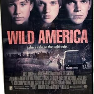 Wild America movie poster featuring Jonathan Taylor Thomas, Devon Sawa, and Scott Bairstow.