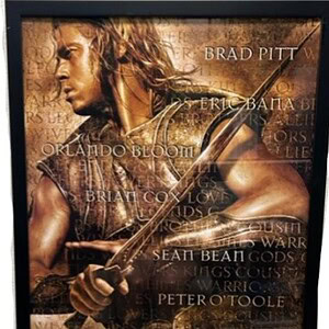 Troy movie poster framed, featuring Brad Pitt as Achilles, with a warrior pose and ancient Greek the.