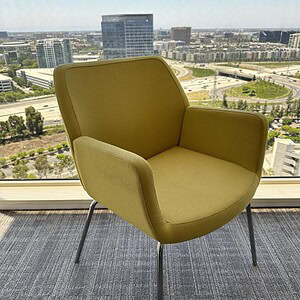 Yellow Coalesse Bindu Side Chair for modern office spaces.