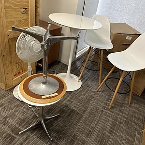 Eames Eiffel counter stool in white with wooden legs, perfect for modern kitchen or bar area.