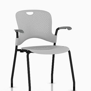 Herman Miller Caper grey chair with armrests and perforated backrest.