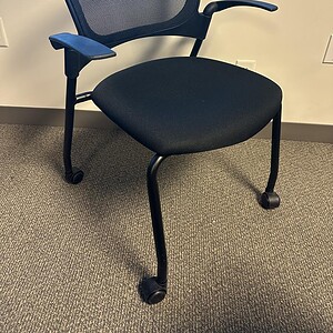Office crepe black mobile training chair with mesh backrest.