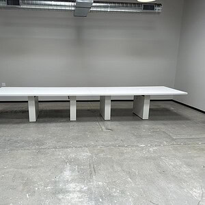 Steelcase Payback conference table with integrated power outlets.