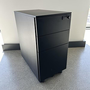 Locking caster mobile pedestal for office storage and organization.