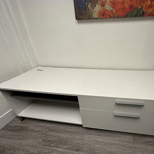 Credenza with shelf for office storage and organization, featuring a sleek white finish and modern d.