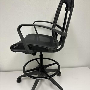 Grey mesh ergonomic office chair with adjustable height and swivel base.