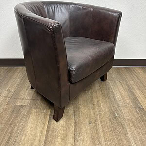 Addyson Living club chair in rich brown leather, perfect for living rooms or offices. Elegant, comfo.