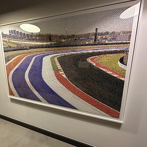 Colorful race track artwork displayed at Cube World USA, inspired by Day At The Racetrack Art.
