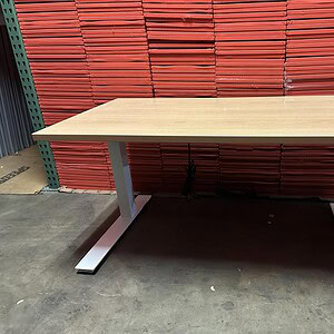 Electric height adjustable desk for ergonomic workspace comfort.