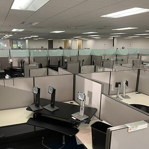Herman Miller A02 6x6 53/47in Hi-Lo modern desks in an office setting.