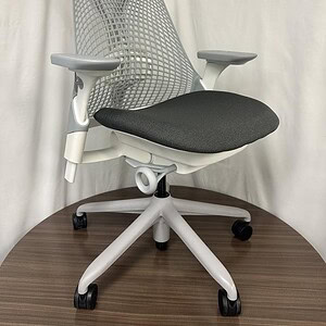Herman Miller Sayl white and grey ergonomic office chair for modern workspace.