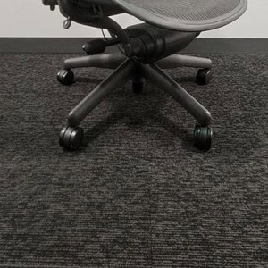 Aeron Black ergonomic office chair with lumbar support and dual paddles for adjustable comfort.