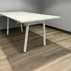 White 6x3 modern conference table ideal for office meetings and collaborative spaces. Sleek design w.