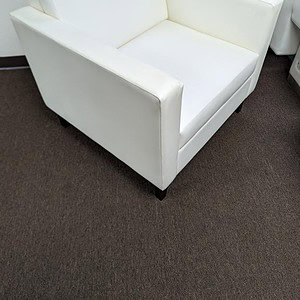 Gunlocke white leather polyurethane armchair for modern office or lounge spaces.