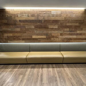 Gunlocke Saddle Brown banquet bench for commercial spaces, featuring durable leather upholstery and.