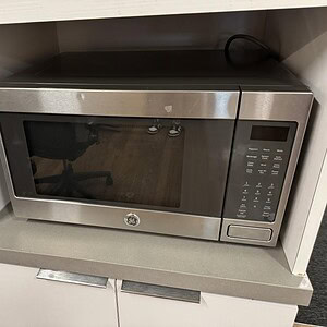 Commercial microwave oven for food heating and cooking.