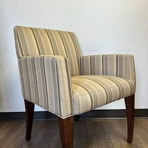 Bernhardt striped lounge chair with veneer legs, perfect for stylish home decor.