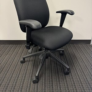 Ergonomic black office chair with adjustable armrests, perfect for workspace comfort and support.