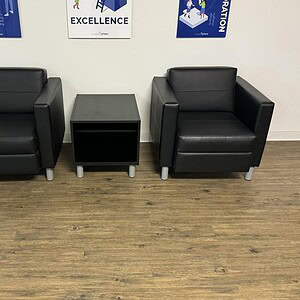 OFS Black Club Lounge Chairs for commercial spaces, featuring modern design and comfort, ideal for l.