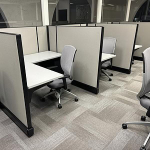 Office cubicle with Herman Miller A02 5x5 panels, 53-inch height, neutral color.