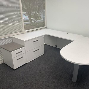 Modern Friant 6x8 white bullet desk for office workspace.