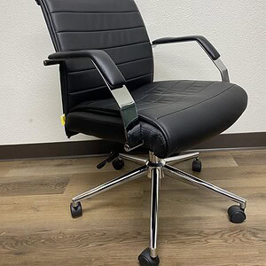 Black leather conference chair with chrome accents and adjustable height.